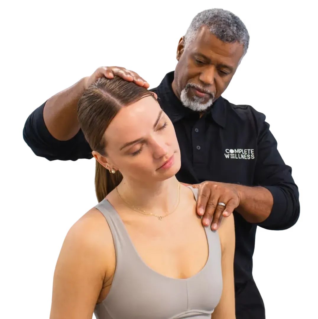 Chiropractor performing a gentle neck adjustment
